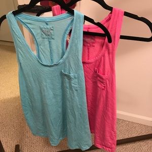 Blue and pink tanks